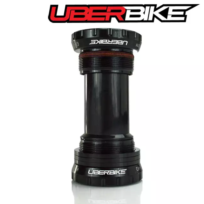 Black Uberbike bottom bracket with Uberbike logo on the cups.