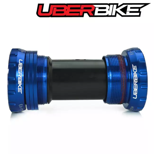 Blue Uberbike bottom bracket with Uberbike logo on cups.
