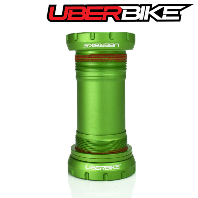Green SRAM Ceramic DUB Bottom Bracket with the logo of Uberbike in white.