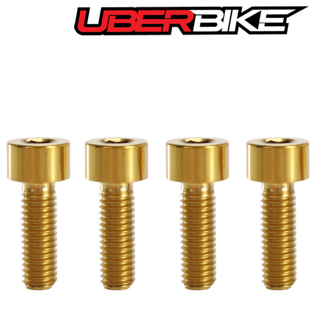 4 gold colour Uberbike M5x15 Avid Titanium bolts in a row.