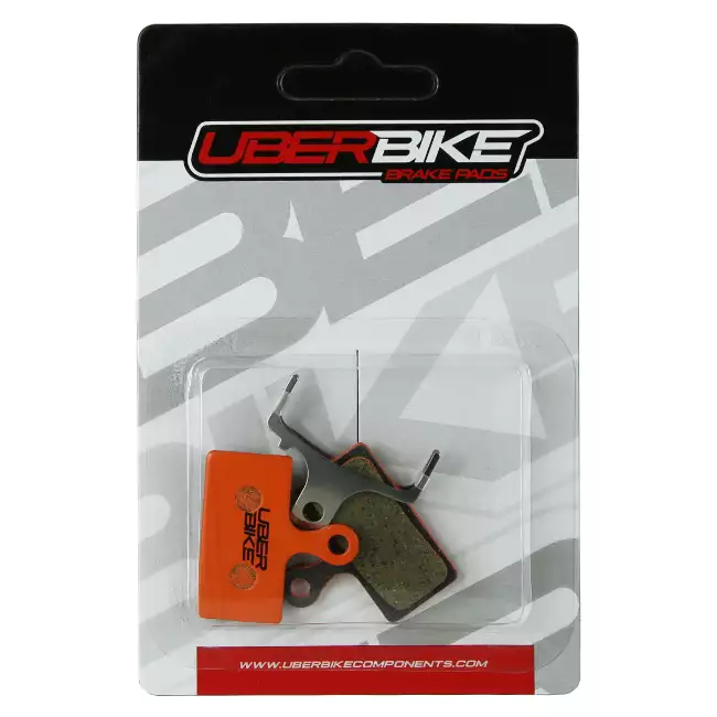 Uberbike Kevlar XTR Disc Brake Pads in packaging, with Uberbike logo in middle of them.