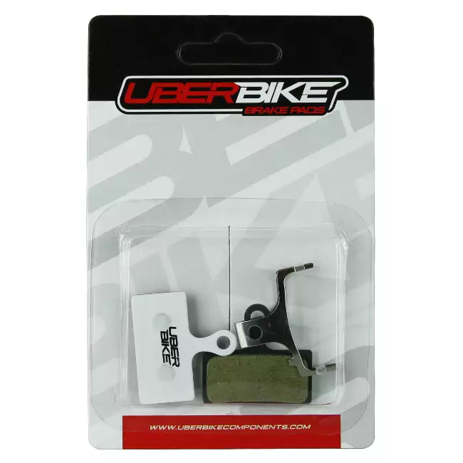 Uberbike Race Matrix XTR brake pads in packaging, with Uberbike logo in middle of them.