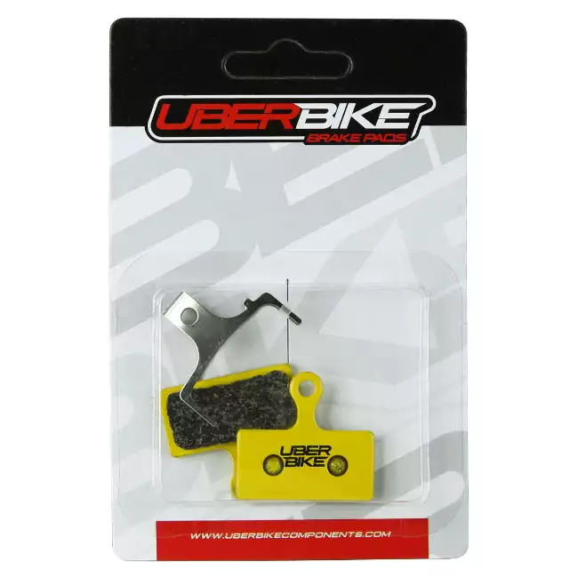 Uberbike Sintered Disc Brake pads in packging, with Uberbike logo in middle of them.