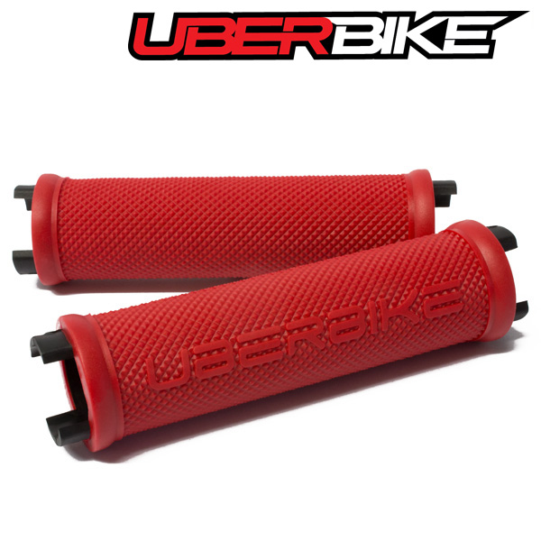 Uberbike Red Skinny Logo Replacement Grip Inserts, with Uberbike logo written across them.
