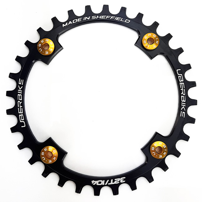 Gold colour Uberbike chainring bolts fitted in Uberbike chainring. 